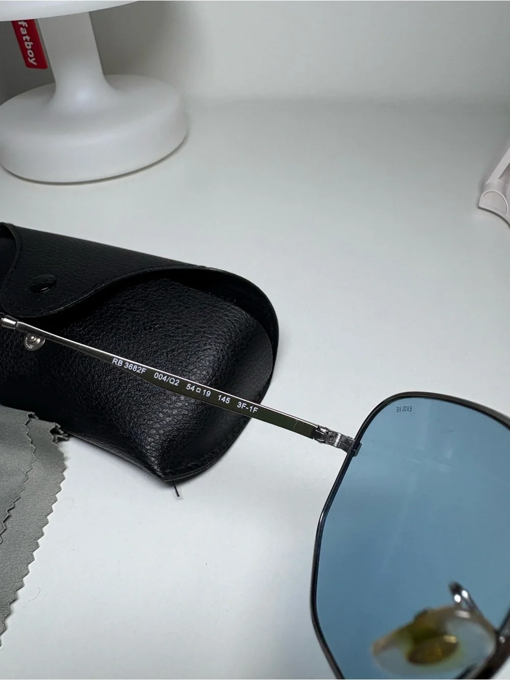 Ray-Ban Silver Frame Sunglasses with Blue Lenses